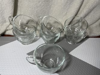 Glass cups and ladle 