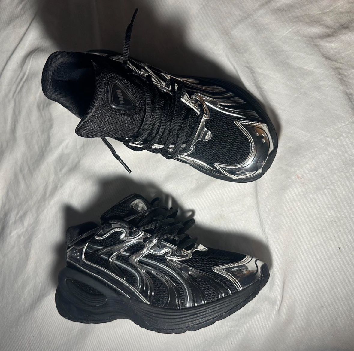 Black and Silver Puma Inverse.