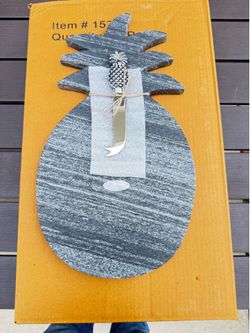 Charcuterie/cutting board with knife.