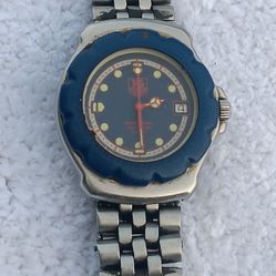 Vintage TAG Heuer Formula 1 medium-sized quartz watch with blue bezel