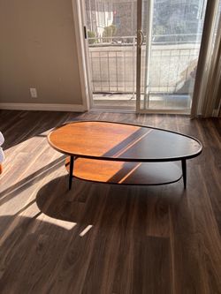 Mid-Century Modern Oval Coffee Table – Wood & Black Metal