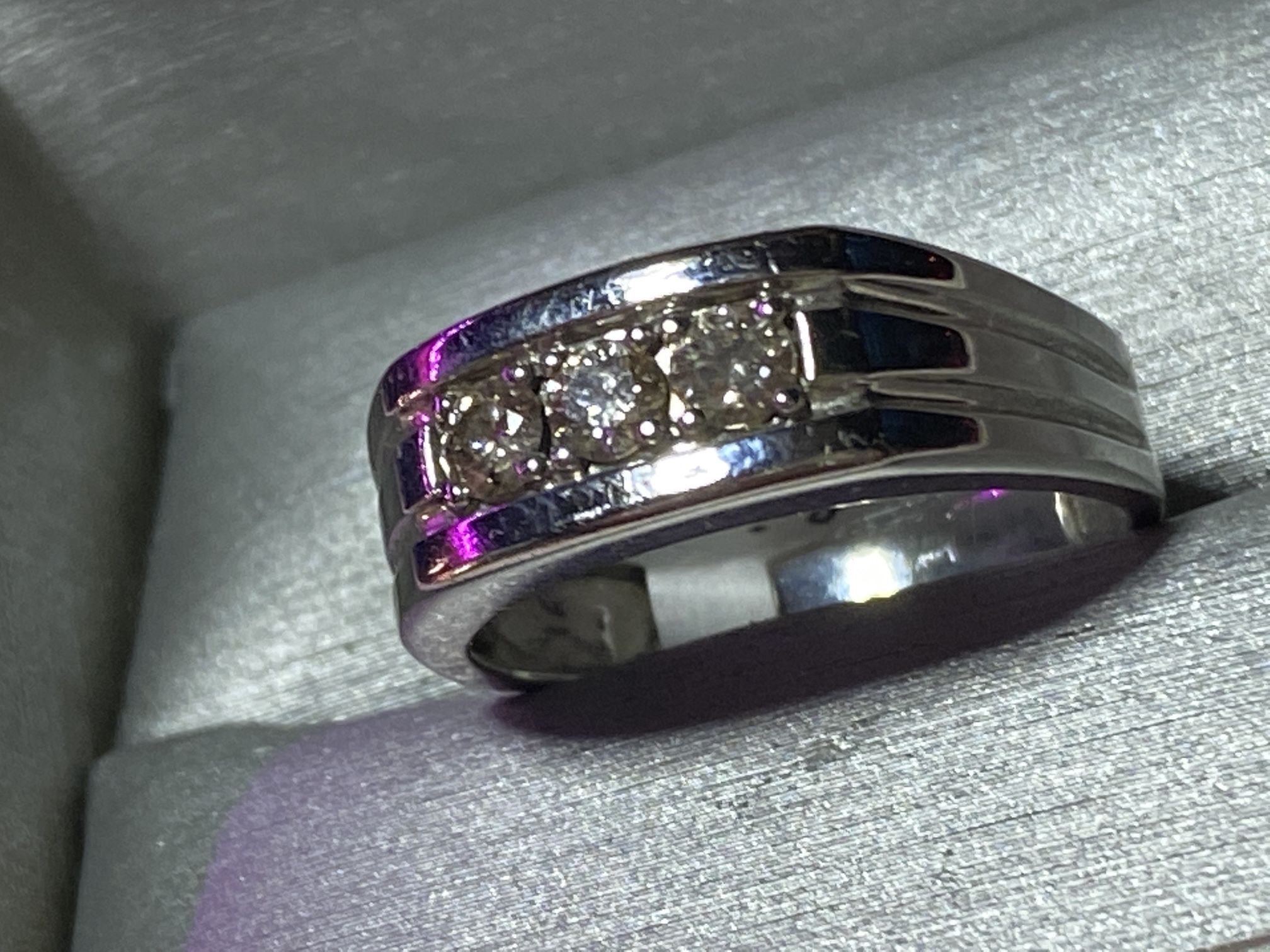 Man diamonds rhodium over 10 K gold ring