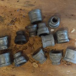 1" galvanized reducing couplings & caps.