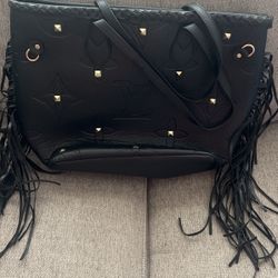 black pocketbook with fringes 