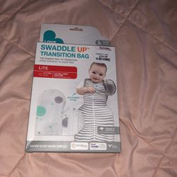 1 grey swaddle transition sleeper 