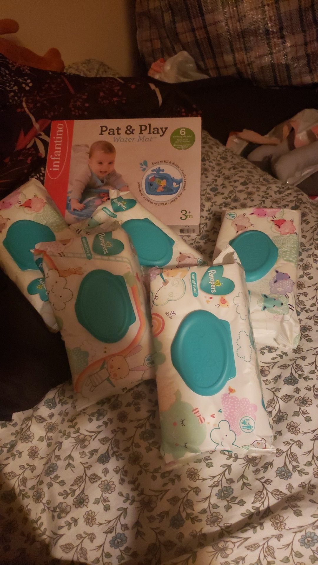 5 packs of Pampers Sensitive Wipes and Pat and Play water mat