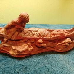 Indian And Canoe With Dog