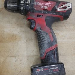 Milwaukee Drill 2408-20 & battery 48-11-2402 used 885263-1
