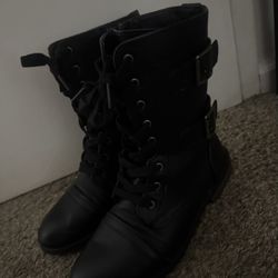 Black flat combat boots