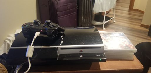 PS3 WITH BOX AND GAME 80GB