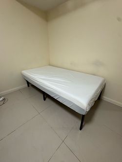 Twin Mattress with Black Metal Bed Frame