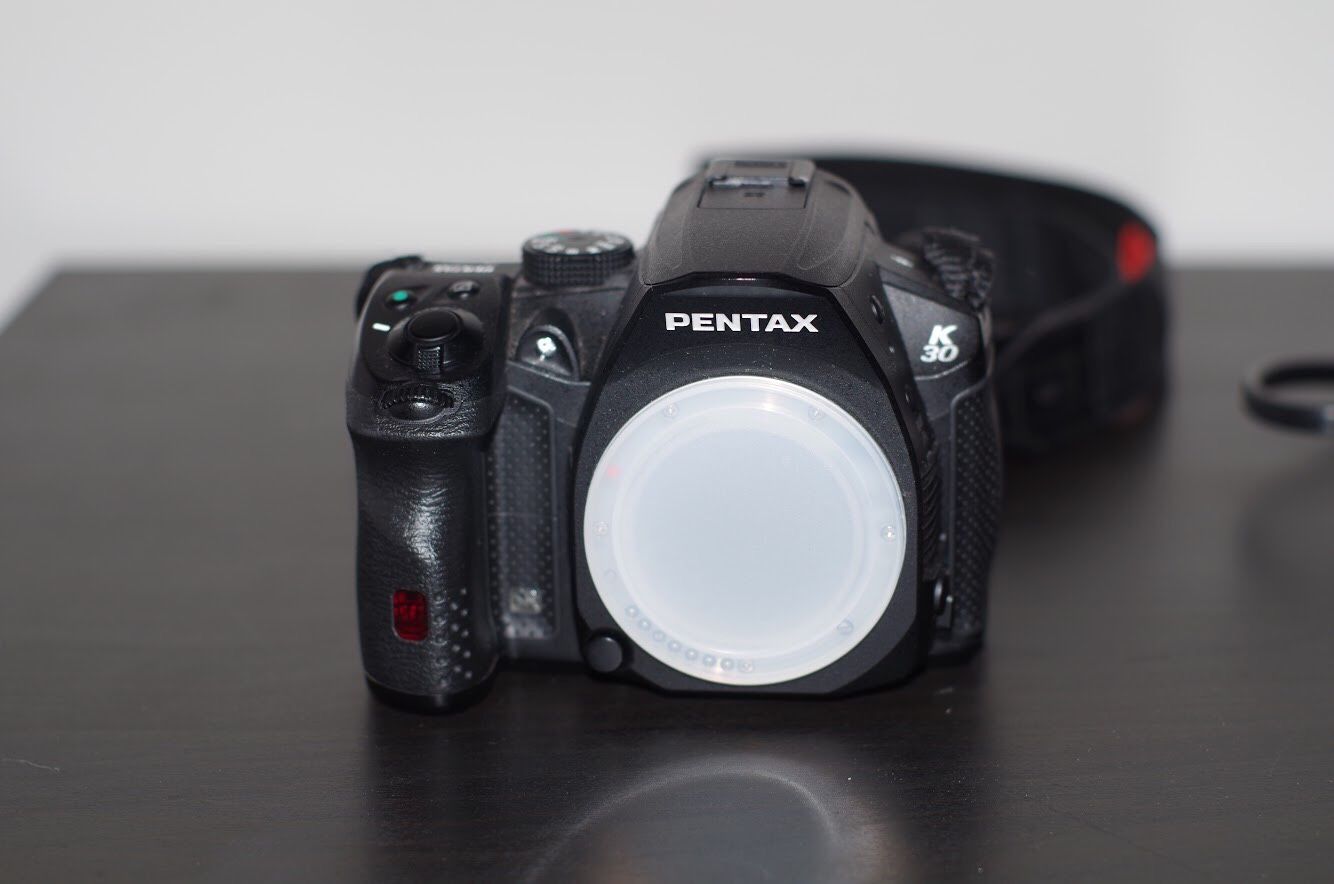 DSLR camera Pentax K30 with Kit lens 18-135mm plus 50mm f1.4 lens.