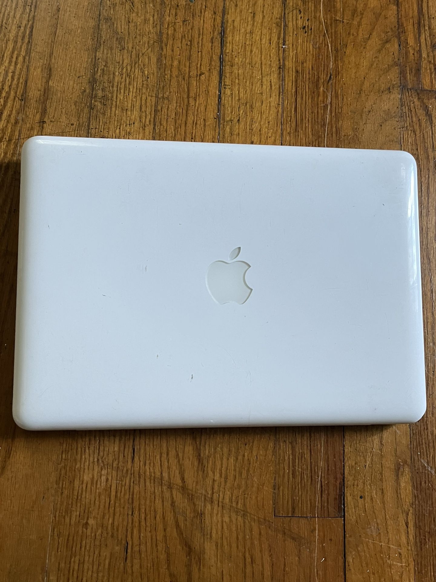 Laptops Older Model ( Non-working 4 Laptops, 1 MacBook)
