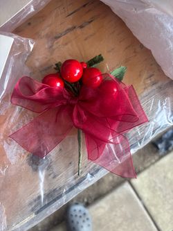Artificial red berry for napkin sets or gift wraps