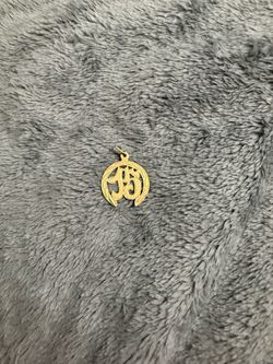 Dije de 15 oro 14k  $80