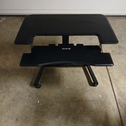 Mobile height adjustable desk.