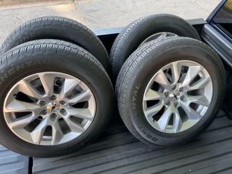 Brand new tires! 275/60R20.   6 lugs  Polished aluminum. Chevy, GMC ETC