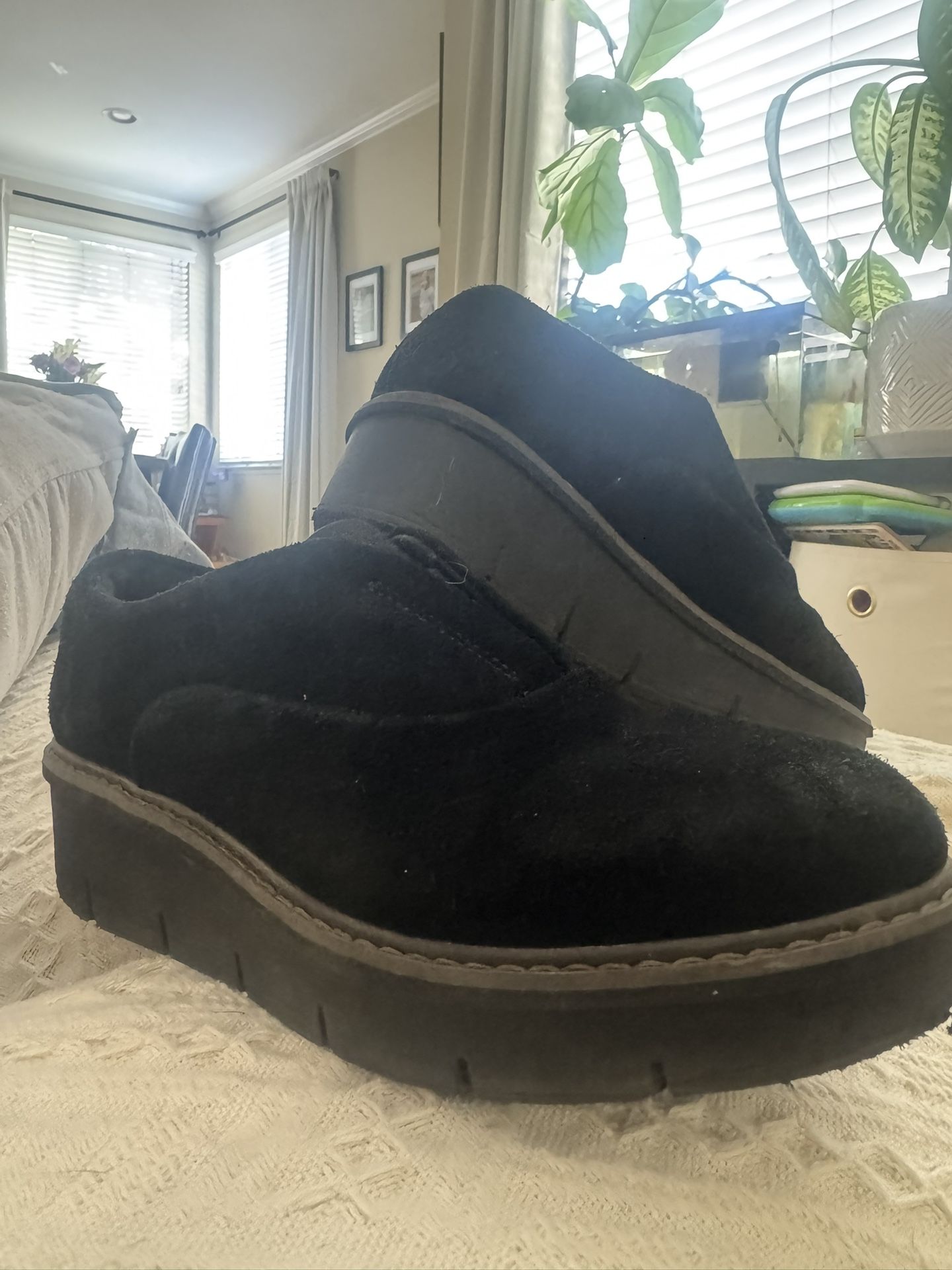Clarks Airabell Sky black suede slip-on wedge shoe.