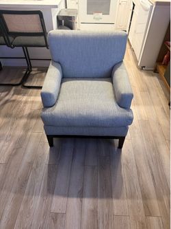 Designer cushioned arm chair