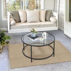 28 Inches Clear glass table with black legs ! Delivery and pickup available