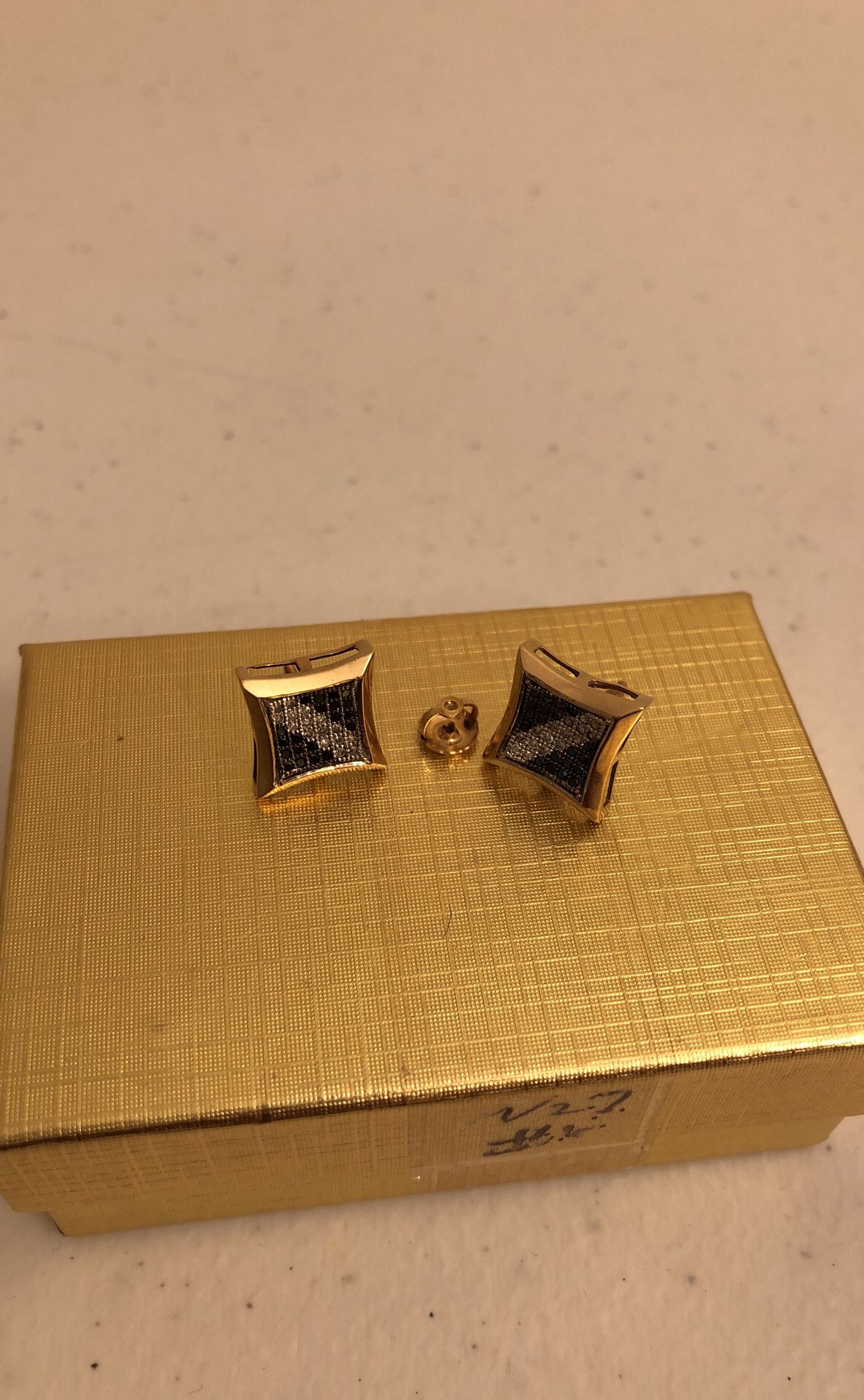 10k gold diamond pave earrings.