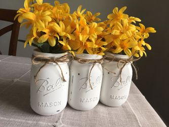 Distressed mason jar vases with silk flowers included! You pick the jar/flower colors $16 for 3