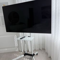 Sony Bravia 65” 4K Smart TV with Rolling Stand. Model XBR-65X900F. Excellent condition.