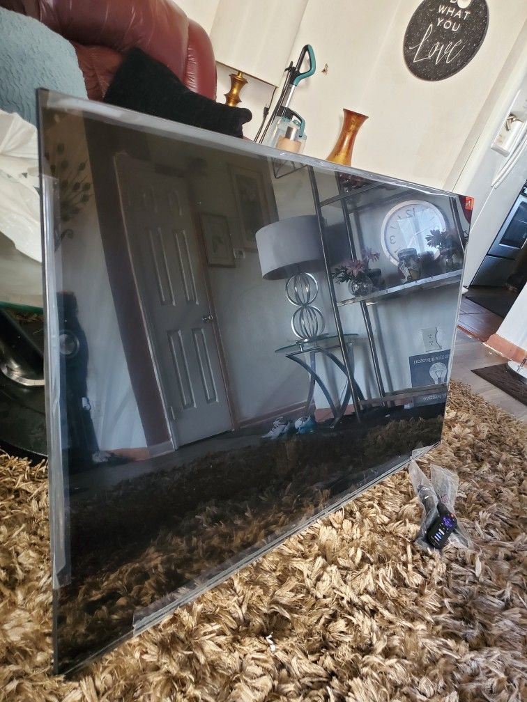 55" TCL Roku Smart Tv 4k Basically New Out Box Lost Legs But Come With Swivel Mount Set. Still Have Tags & Plastic Cover Around Edge