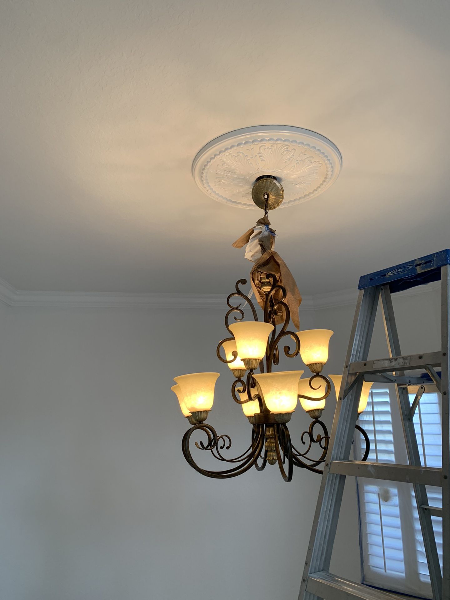 Big chandelier hundred percent working with white Medallion