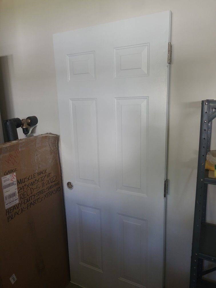 791/4"x313/4" Prepainted Entry Door. In Very Good Condition!