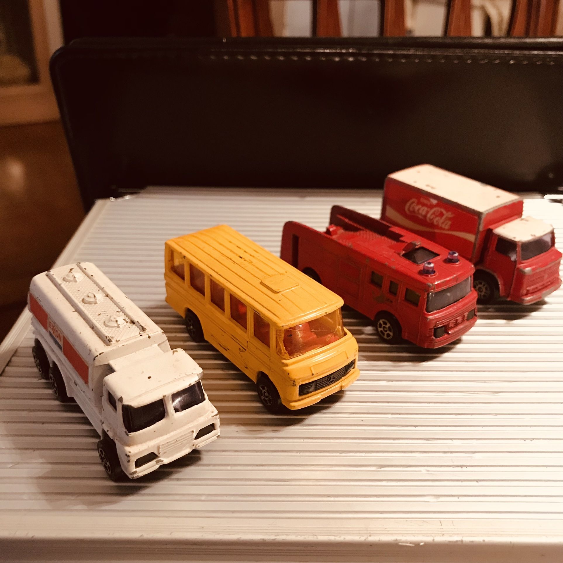 3 Vintage Corgi Juniors Coca Cola, Exxon, Mercedes Benz Bus and ERF Fire Tender