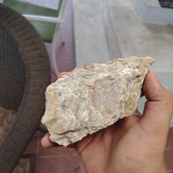 Rock with a bunch of mica shards