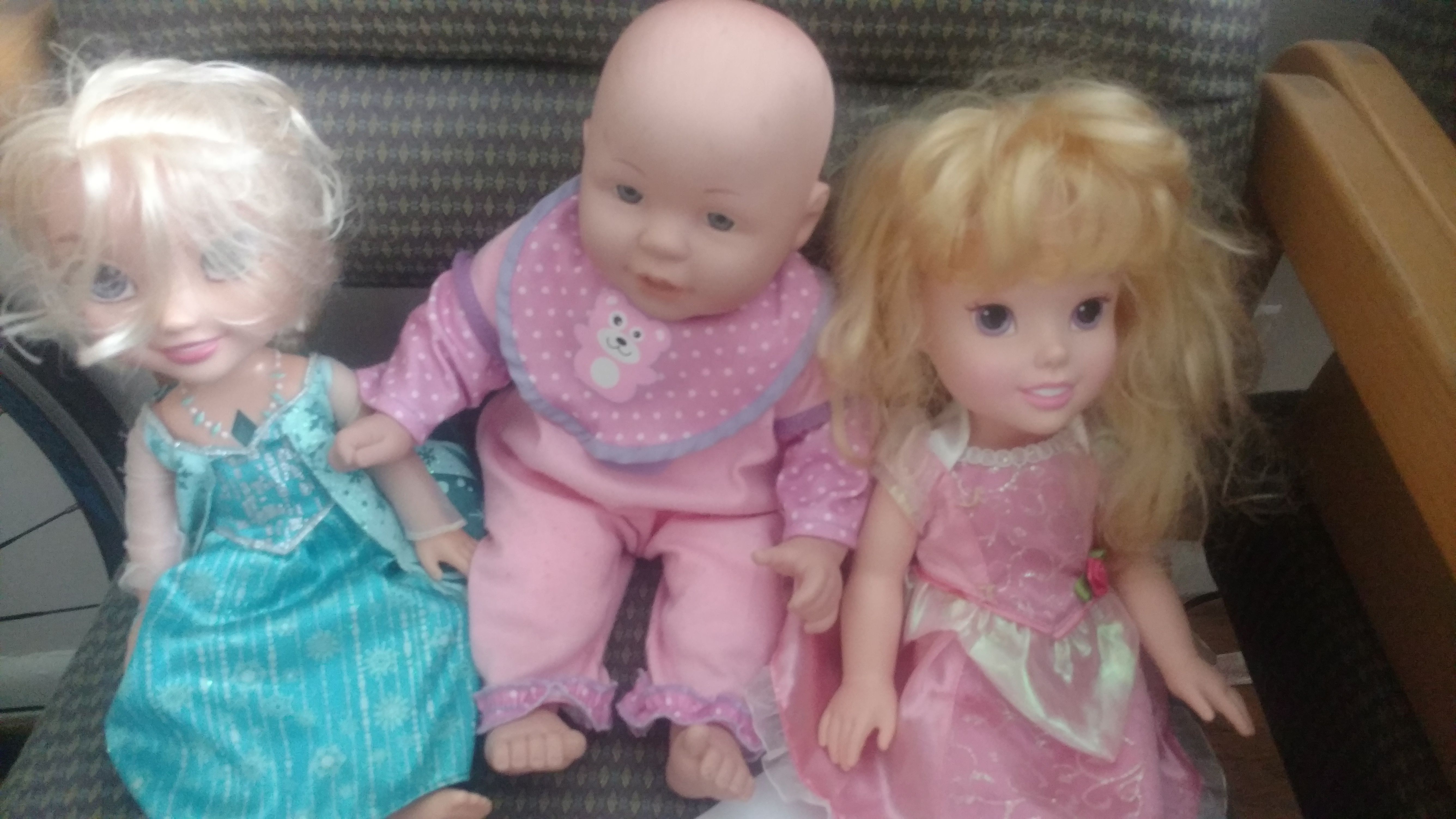 Wonderful set of DOLLS. The dolls wear pretty princess dresses.