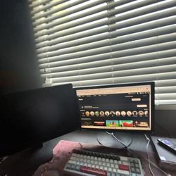 entire gaming setup (includes pc , creamy keyboard , mouse , 2 monitors )