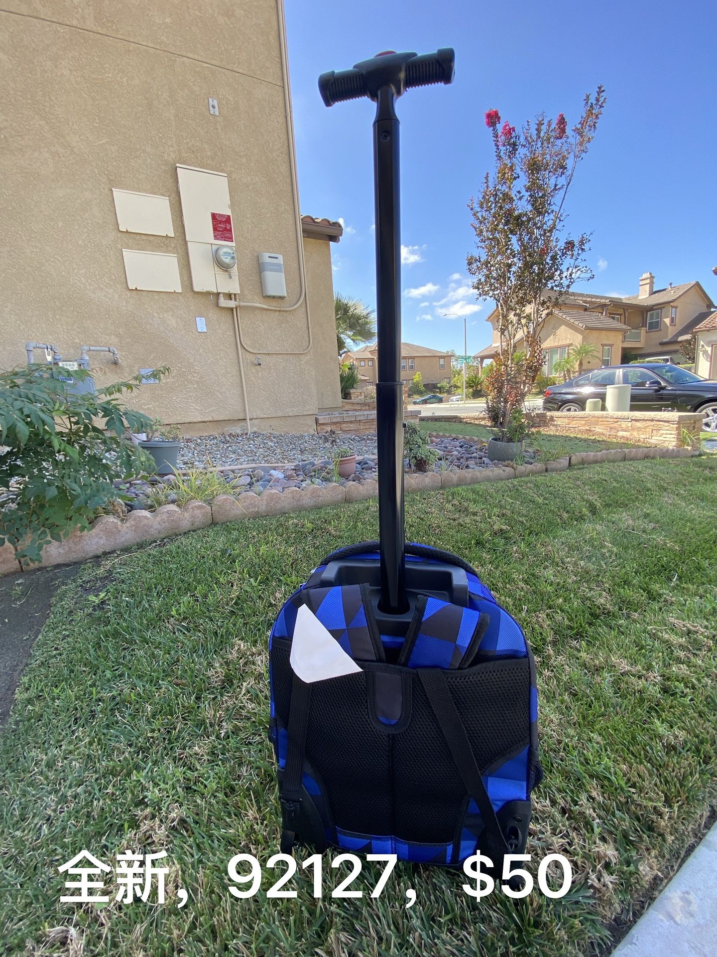 J World New York Rolling Backpack