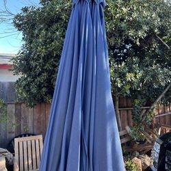 9ft patio umbrella in blue (no base); has lights