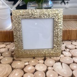 Nicole Miller Gold Frame