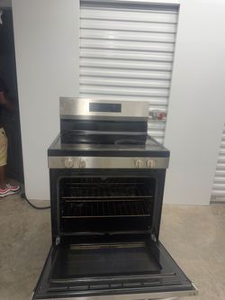 Glass top stove, stainless steel 3 door refrigerator and freezer