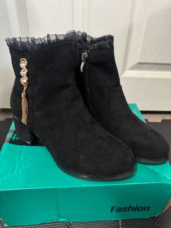 Women’s black suede bootie’s with riffle trim and charm