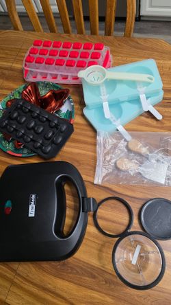 Kitchen things, kitchenware, kitchen stuff.
What is seen in the photo.