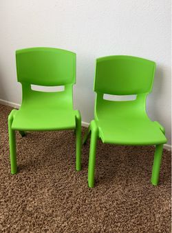 Green toddler stackable plastic chairs
