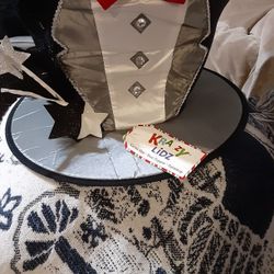 Krazy lidz santa hat, treetopper, tabletop. Tuxedo