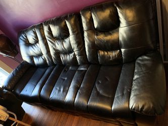 Black Leather Sofa and Love seat with Ashley Fireplace