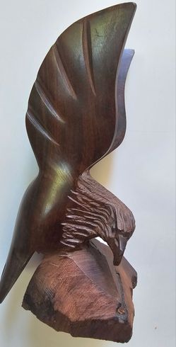 Vintage Ironwood Hand Carved Eagle with Wings Mexican Folk Art Figurine Sculpture
Approximately  6 1/2" tall.
Excellent condition 
Beautiful details 
