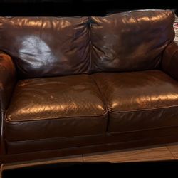 Real leather sofa and love seat good condition for sale in $700 only