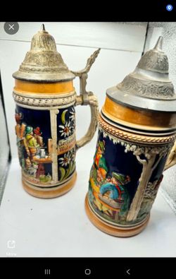 Vintage 20th-century souvenir lidded beer steins