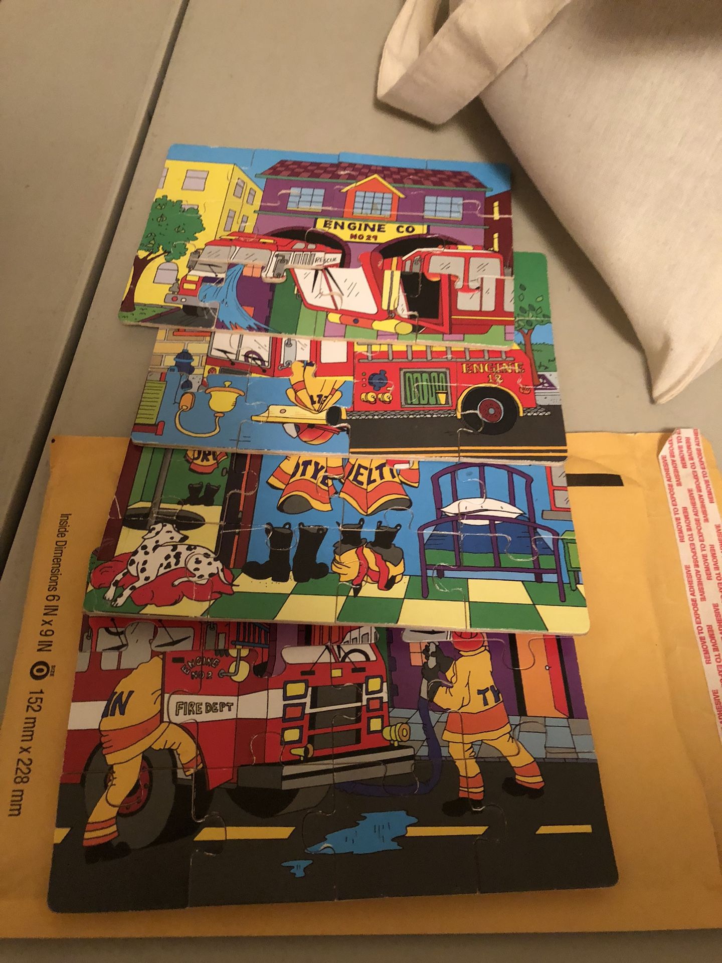4 Fire Truck & Dalmatian Dog Puzzles $1. Ea.