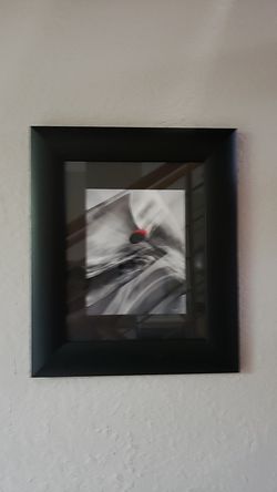 Three wall pictures frames in black. 18 1/2 x 16.. Good condition