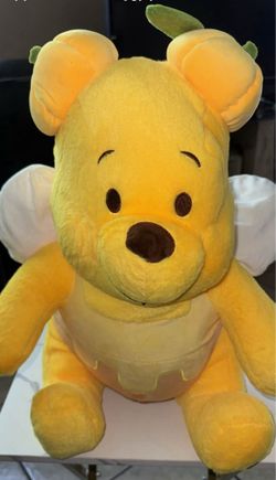 Winnie the pooh plushie and blanket