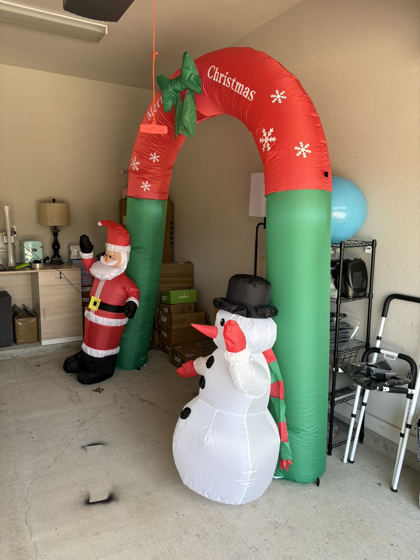8 Foot Tall Lighted Christmas Inflatable Santa Claus and Snowman Archway with Bow LED Lights Yard Art Decoration
